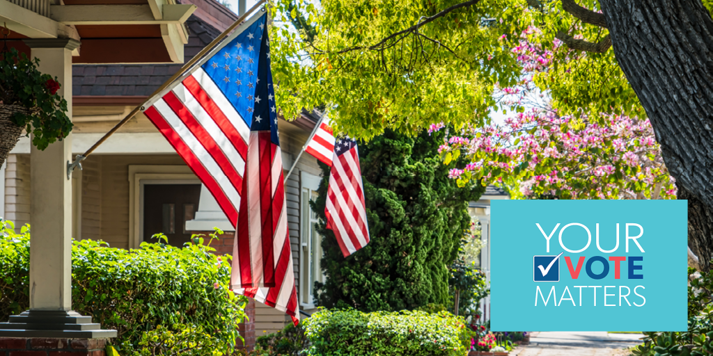 Your Vote Matters - American flags hanging up in neighborhood
