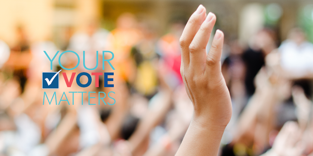 Your Vote Matters - hand raised in a crowd