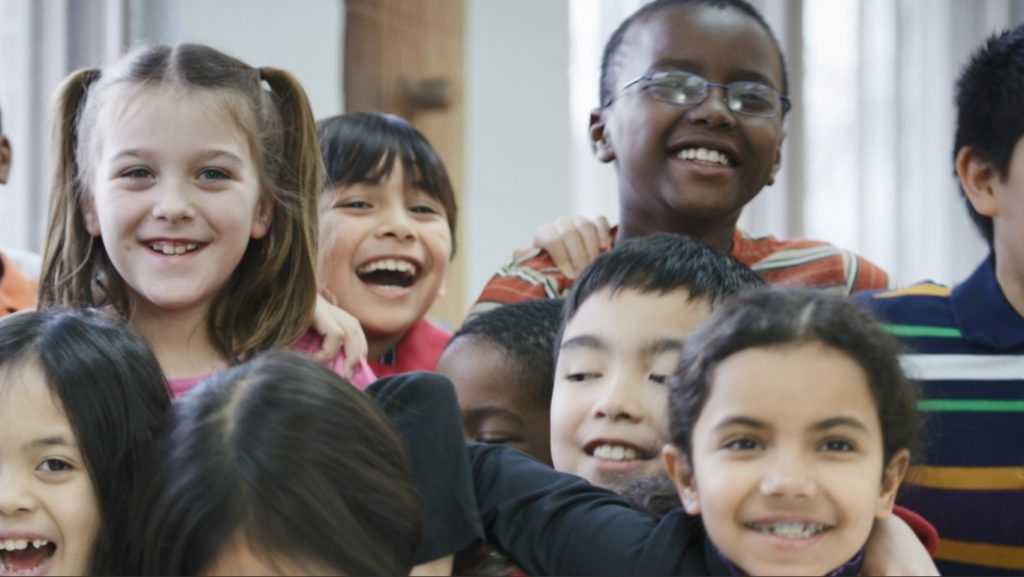 group of diverse children smiling