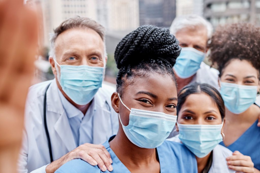 Health care workers wearing masks